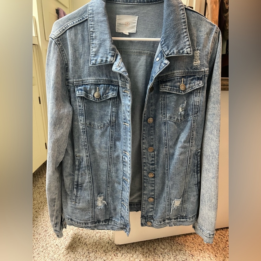 Distressed oversized denim jacket